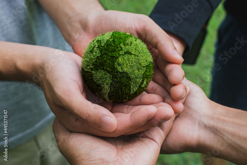 Earth Day. Hands adult Teamwork harmony Holding earth on hands. Environmental and reduce global warming help earth, top view. ecology and environment sustainable concept..
