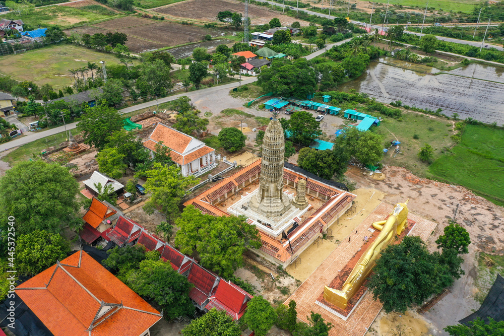 Fototapeta premium Wat Aranyikawas temple, reclining buddha and pagoda, in Chon Buri, Thailand