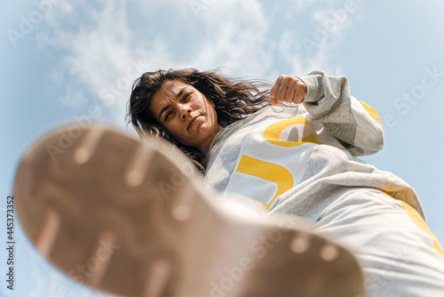 Kicking, humiliating a person. Psychology of relationships. Hand in fist photo