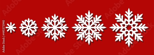 Set of snowflakes of different sizes. Silhouettes of decorative ornaments for Christmas, New Year, winter holidays. Vector template for plotter laser cutting of paper, wood carving, metal engraving.