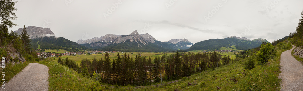 Fototapeta premium Panorama view Zugspitze mountain and Ehrwalder Sonnenspitze mountain in Tyrol, Austria