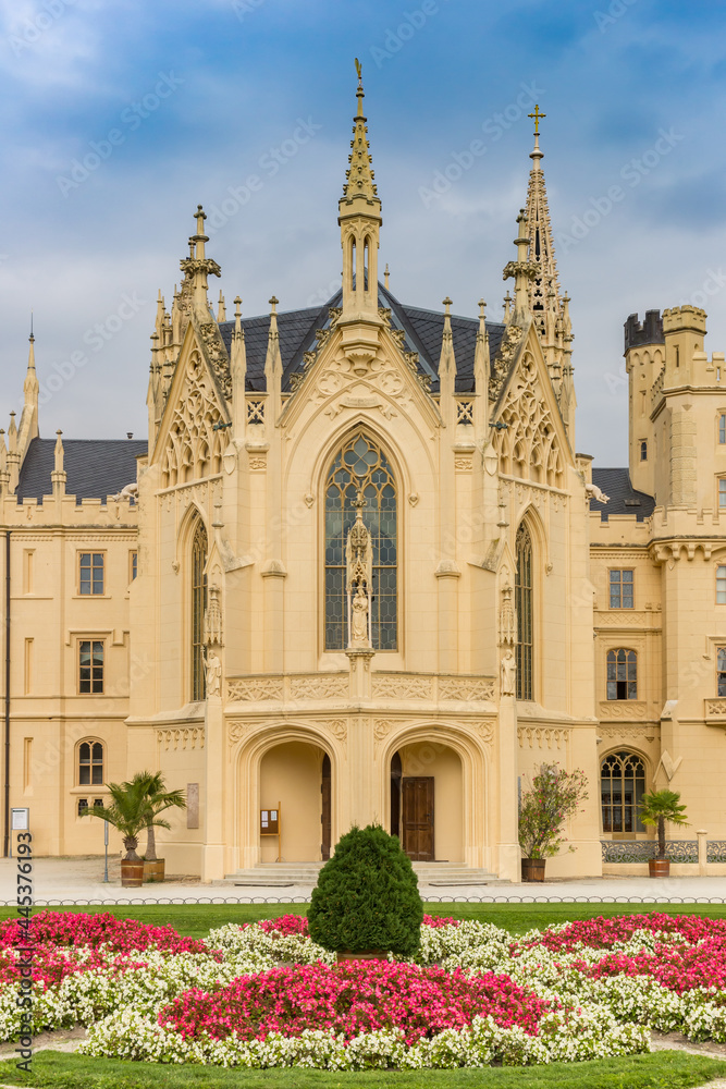 Flowers and front facade of the castle in Lednice, Czech Republic