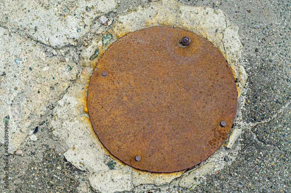 Rusty iron disk with bolts Rusty iron disk with bolts