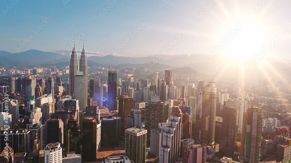 Epic sunset in financial center of Hong Kong. AERIAL view.