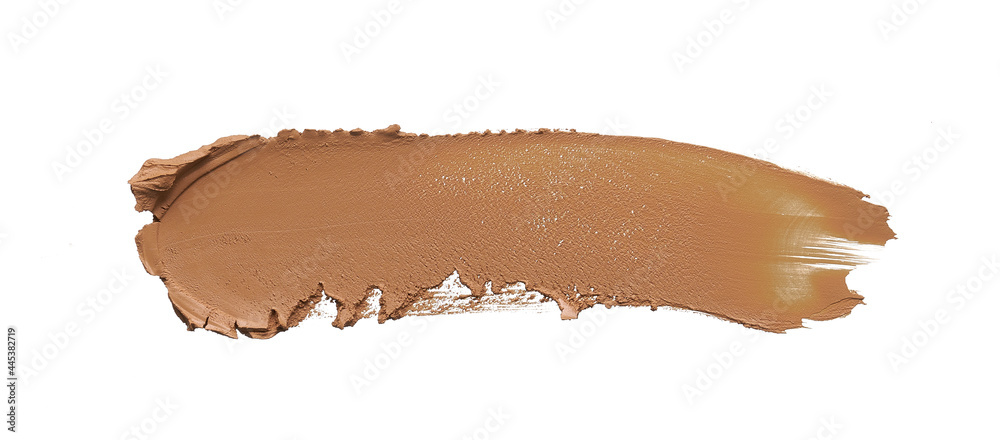 Fototapeta premium Gently beige strokes and texture of makeup foundation or acrylic paint isolated on white background