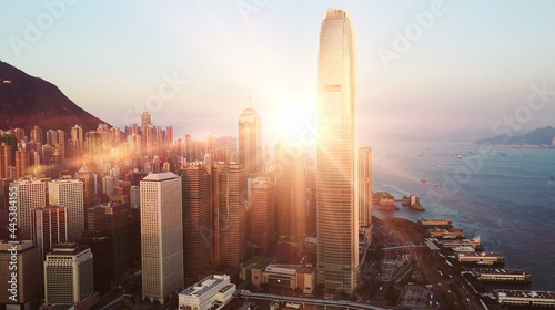 Epic sunset in financial center of Hong Kong. AERIAL view. photo