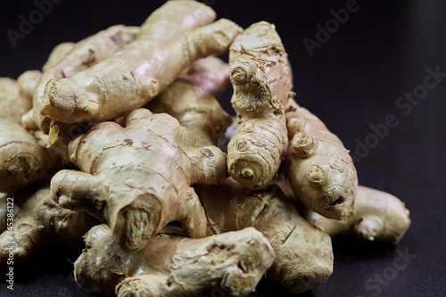 closeup ginger root isolated on black background