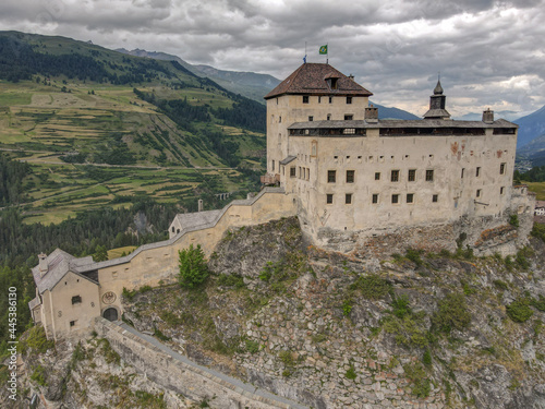 Drone view at Tarasp castle in the Swiss alps