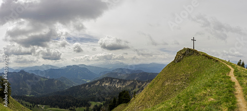 Summit cross of Hochgern mountain in Bavaria, Germany