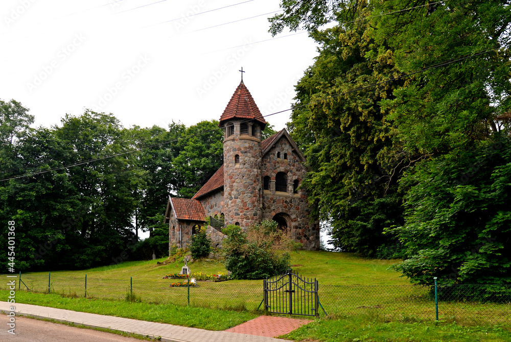 Built in 1925 from field stone, the Neo-Romanesque Evangelical-Ausburg church in Rasząg na warmi in Poland.