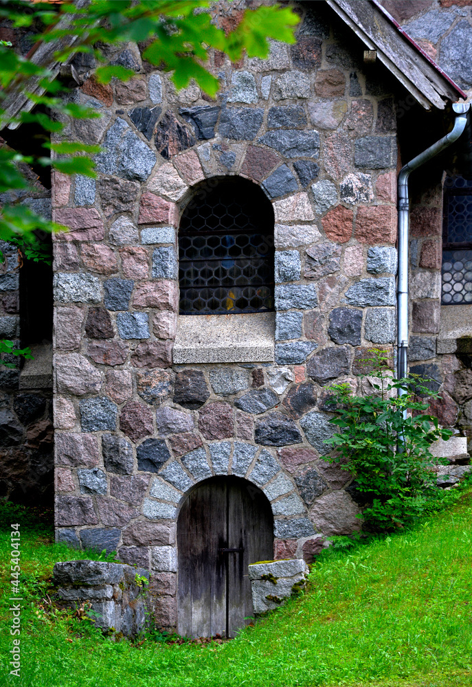 Built in 1925 from field stone, the Neo-Romanesque Evangelical-Ausburg church in Rasząg na warmi in Poland. Built in 1925 from field stone, the Neo-Romanesque Evangelical-Ausburg church in Rasząg na warmi in Poland.
