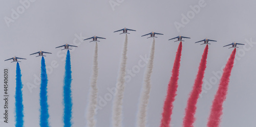 Paris, France - 07 14 2021: Air show of July 14. Alphajet of the patrol of France flying .