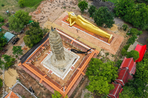 Wat Aranyikawas temple, reclining buddha and pagoda, in Chon Buri, Thailand photo