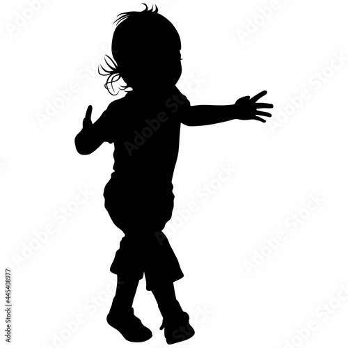 Black silhouette of little girl in short pants in sandals with long hair