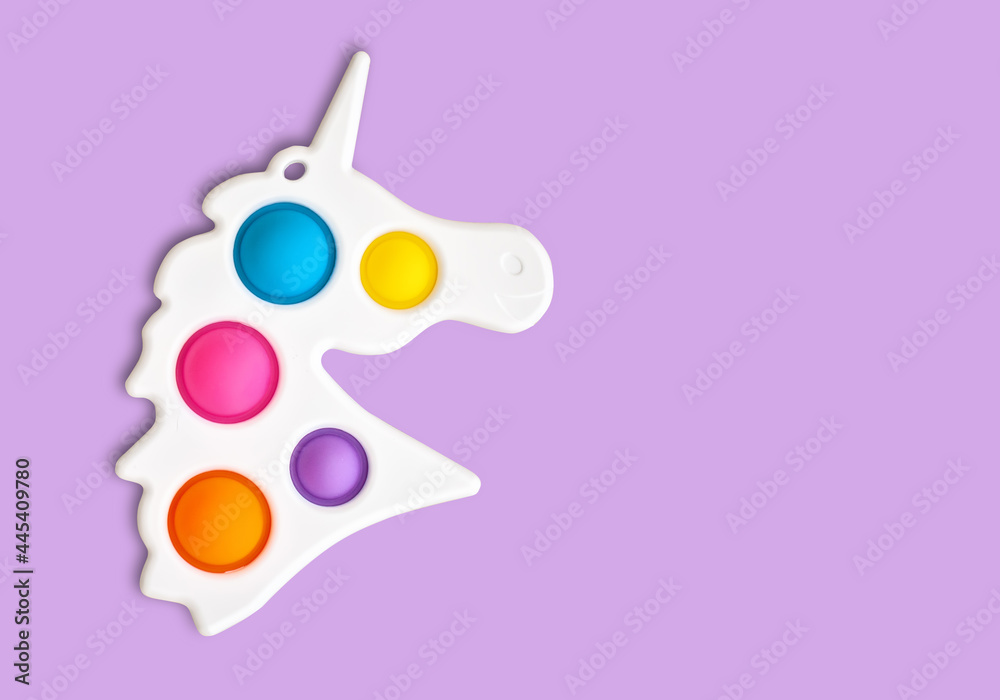 Multi-colored popular silicone anti-stress toy pop it. Colorful anti stress sensory toy fidget push pop it. - obrazy, fototapety, plakaty 