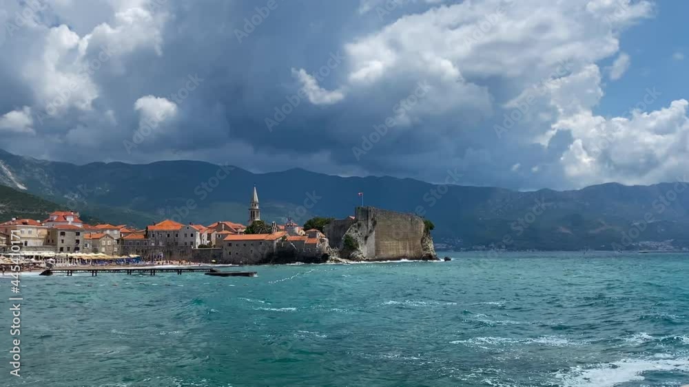 old Budva and adriatic sea with waves top view. Budva. Montenegro 12.07.2021 old Budva and adriatic sea with waves top view. Budva. Montenegro 12.07.2021