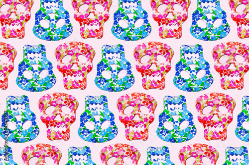 Pattern of rows of red and blue skull masks decorated with floral print photo