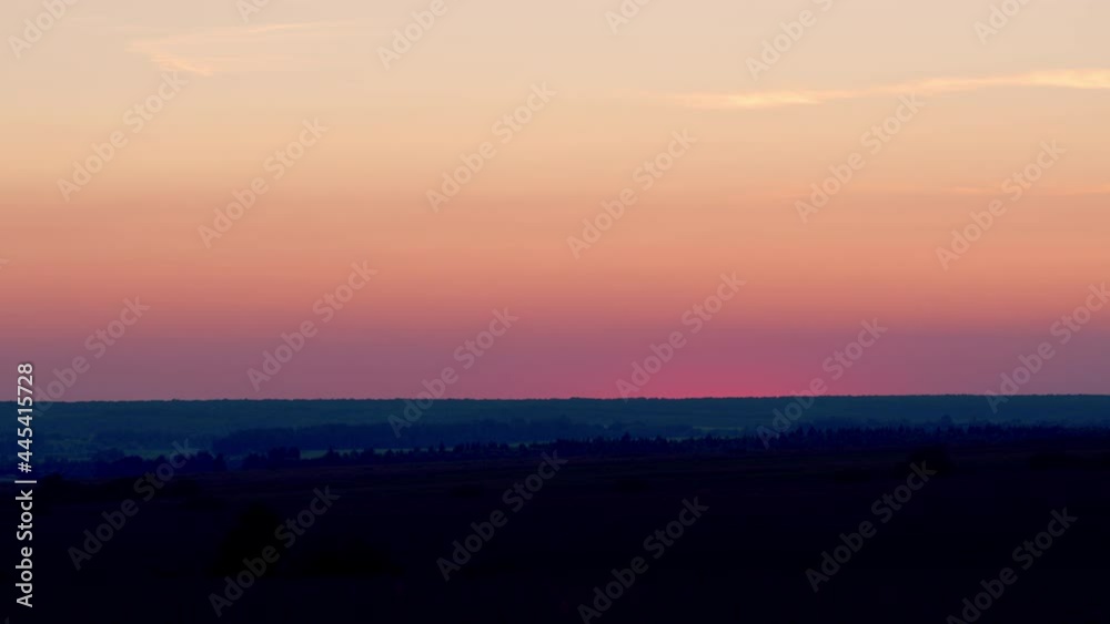 Awesome landscape of sky and silhouette of forest on horizon. Nature and travel concept. Awesome landscape of sky and silhouette of forest on horizon. Nature and travel concept.