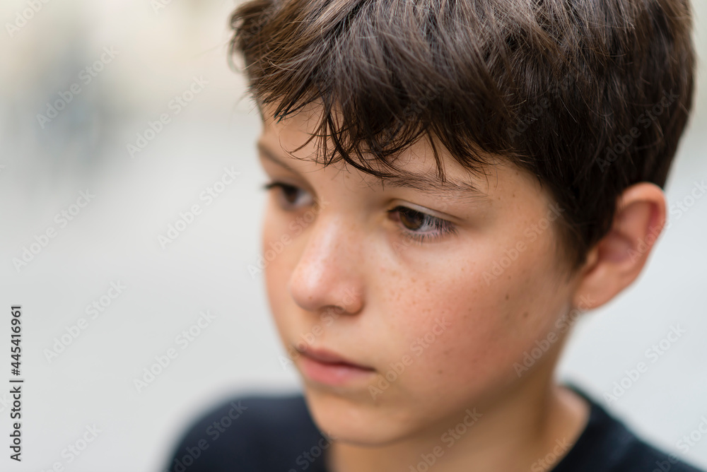 Portrait of a serious child boy outdoors. Portrait of a serious child boy outdoors.