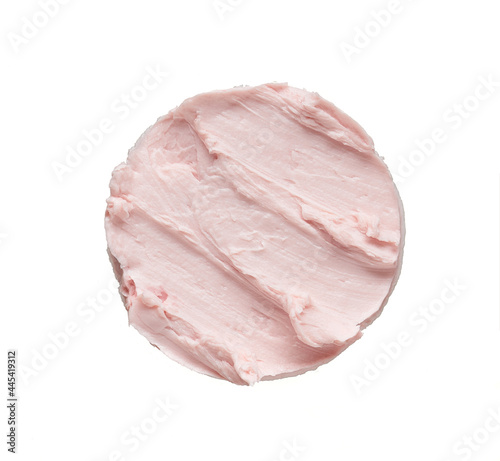 Gently pink smear and texture of face cream or acrylic paint isolated on white background