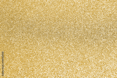 texture of gold glitter fabric, closeup