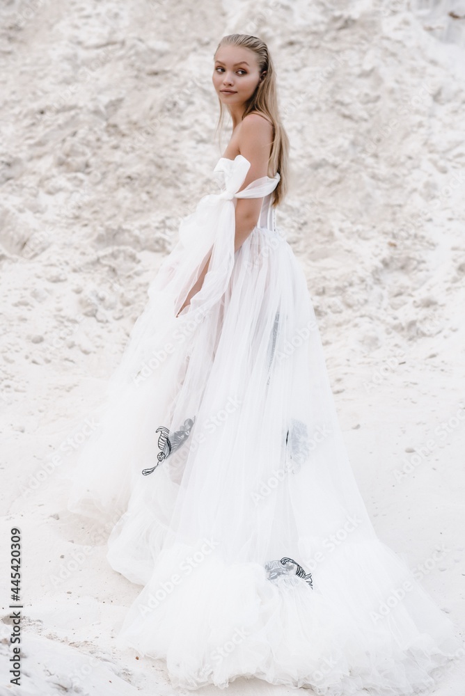 Beautiful wedding bride and groom at wedding day outdoors at ocean beach. Happy marriage couple o