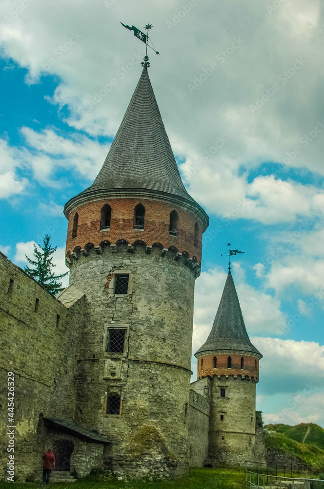 Tower of Kamyanets-Podilsky fortress on a background of cloudy sky