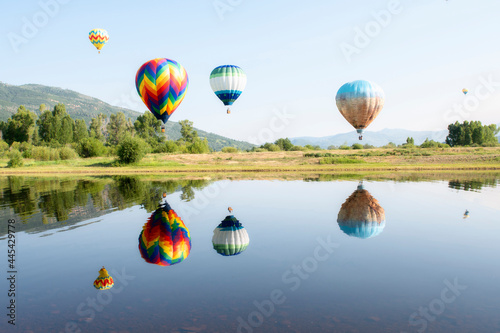 Hot Air Balloons Over a Lake with Reflections in Steamboat Springs, Colorado