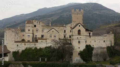 Aerial drone footage view of medieval Castle Coira in Sluderno Bolzano Italy // no video editing photo