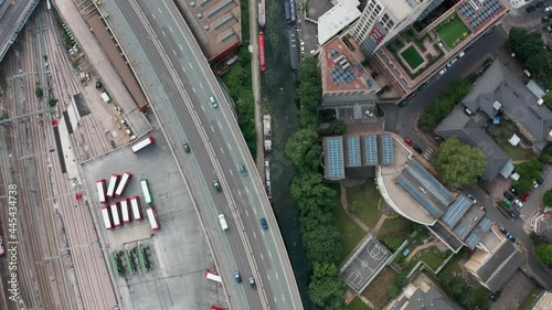Top down drone shot over peaceful London canal system with narrow boats photo