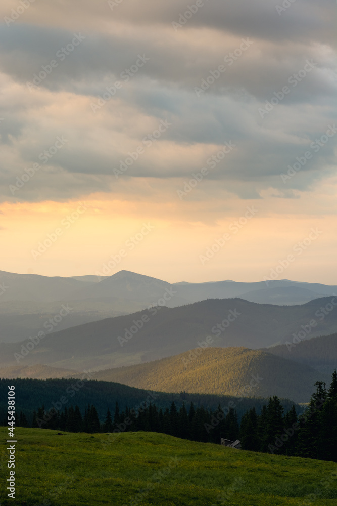 sunset in the mountains with distant mountains silhouettes sunset in the mountains with distant mountains silhouettes