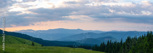 Fogy mountains panorama at sunset