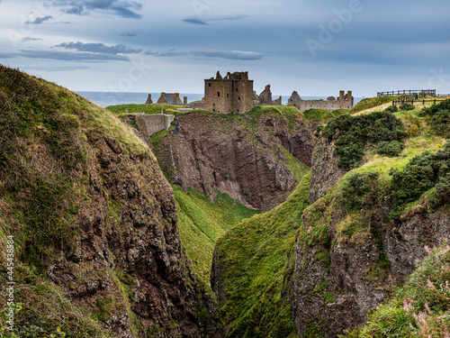 UK, Scotland, Stonehaven, Ravine in front of Dunnottar Castle photo