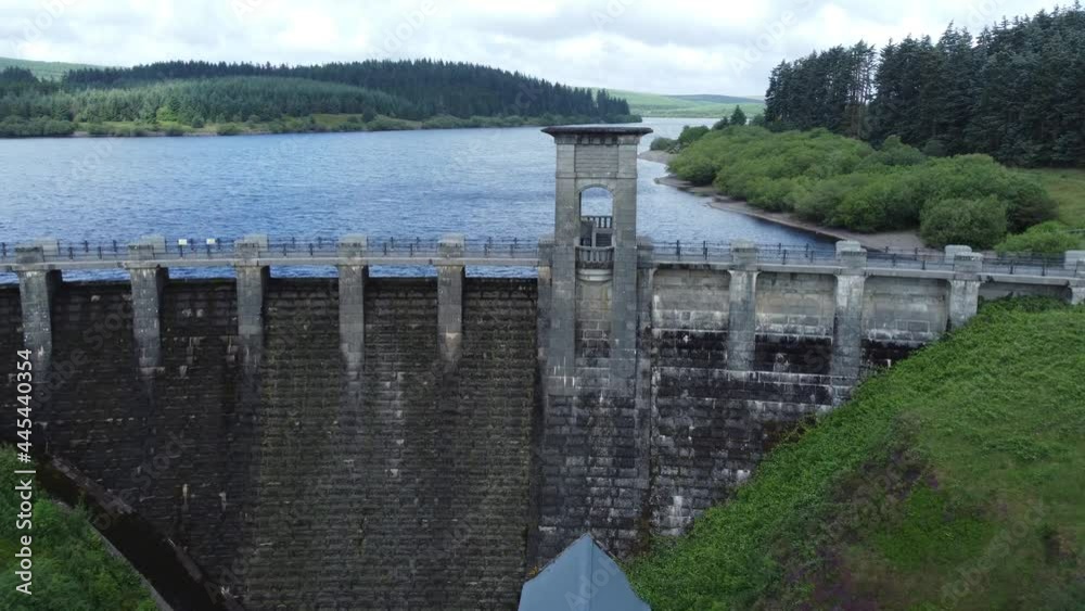 Alwen reservoir Welsh woodland lake water supply aerial view concrete dam countryside park slow fly over bridge Alwen reservoir Welsh woodland lake water supply aerial view concrete dam countryside park slow fly over bridge