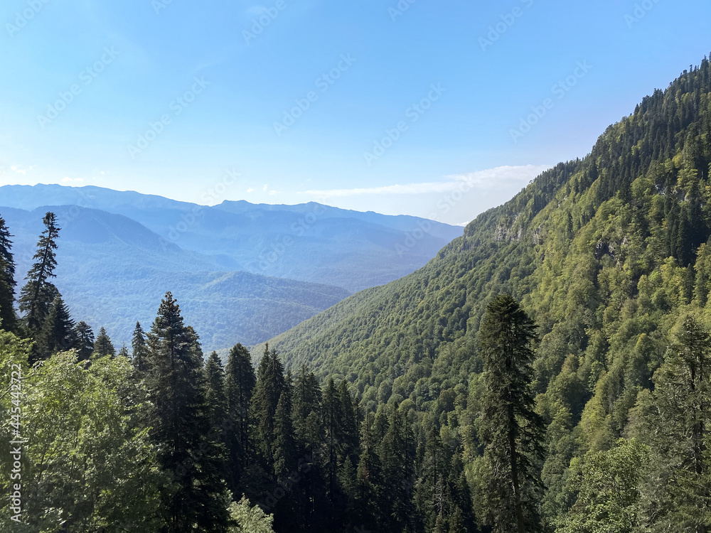 View from the trekking trail Rosa Khutor Ski Resort, Sochi, Russia. Roza Pik is the summit of the Aibga mountain range, which is located at an altitude of 2320 m.