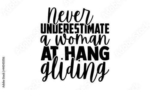 Never Underestimate A Woman At Hang Gliding - Hang Gliding t shirts design, Hand drawn lettering phrase, Calligraphy t shirt design, Isolated on white background, svg Files for Cutting Cricut 