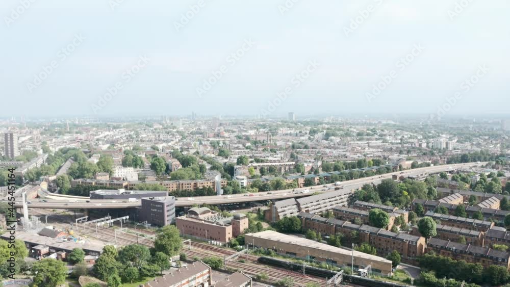 Rising drone shot of Great western high speed train passing under West way bridge London Rising drone shot of Great western high speed train passing under West way bridge London