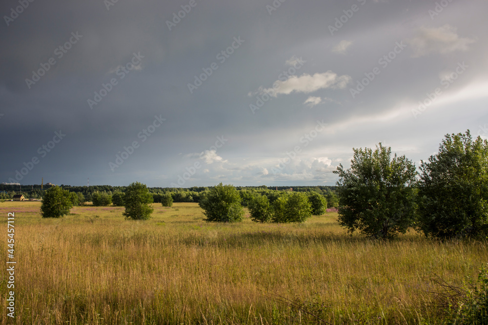 landscape with majestic beautiful dramatic pre-threatening sky. Cloudy sky