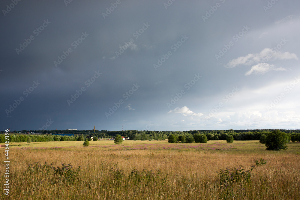 landscape with majestic beautiful dramatic pre-threatening sky. Cloudy sky