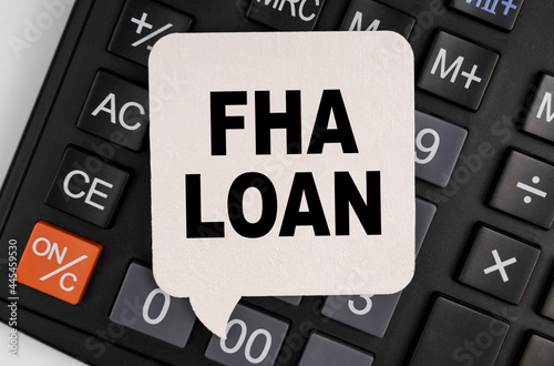 There is a white plate on the calculator with the inscription - FHA LOAN