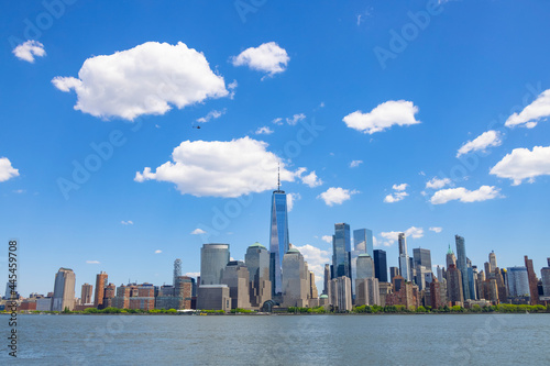 Bild auf Leinwand Unique shape clouds float over the Lower Manhattan skyscraper in springtime at New York City NY USA on May 14 2021