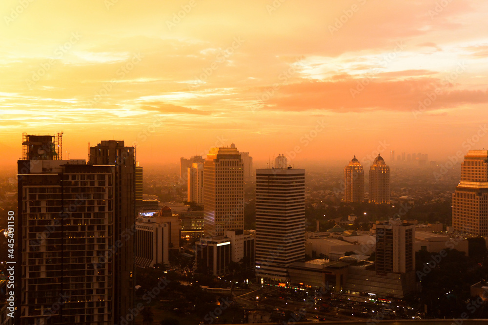 City skyline at sunset in Jakarta, Indonesia