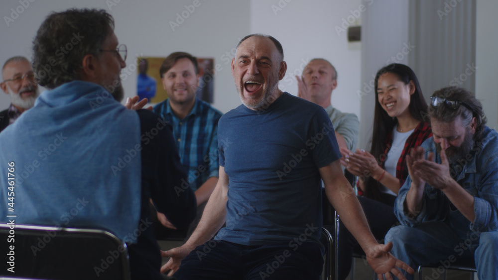 Happy Aged man sharing story of successful addiction overcoming Happy Aged man sharing story of successful addiction overcoming
