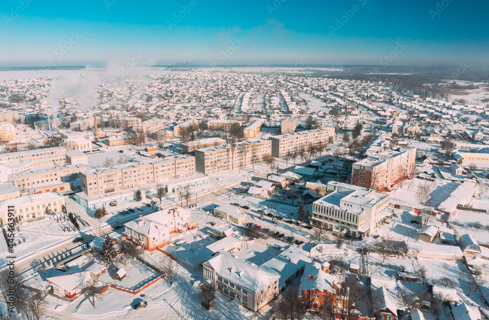 Dobrush, Gomel Region, Belarus. Aerial View Of Skyline Cityscape In Sunny Winter Day. Snowy Landscape Cityscape Skyline Dobrush, Gomel Region, Belarus. Aerial View Of Skyline Cityscape In Sunny Winter Day. Snowy Landscape Cityscape Skyline