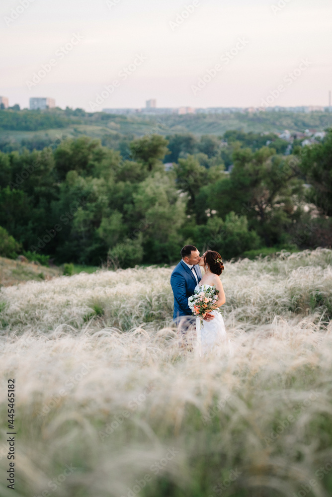 A couple in love a guy and a girl on a walk in the forest belt