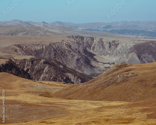 landscape of high alpine desert and mountain peaks photo