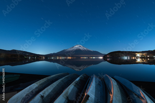 Night view of Mount Fuji from lake Yamanaka, Yamanashi Prefecture, Japan photo