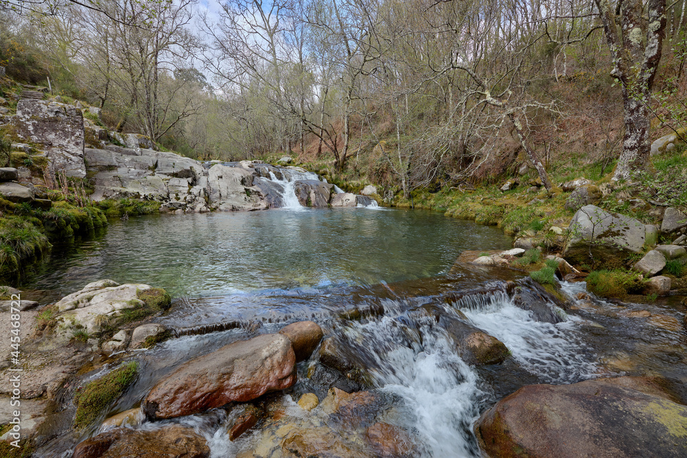Natural pool formed in the rocks by the Cerves river in the community of Galicia, Spain. Natural pool formed in the rocks by the Cerves river in the community of Galicia, Spain.