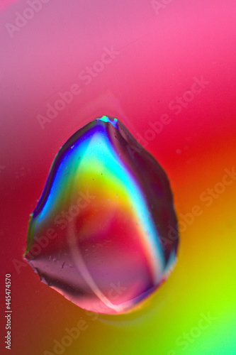 colorful waterdrop on a pink background