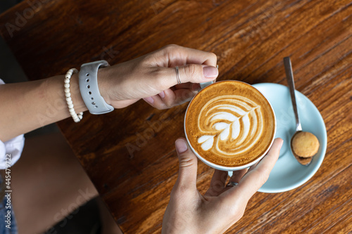 delicious coffee in beautiful cups, morning ritual, a human holds a cup of coffee. strong coffee filter and cappuccino